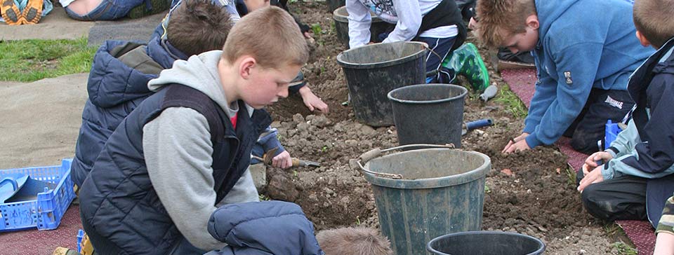 Children digging for historical evidence
