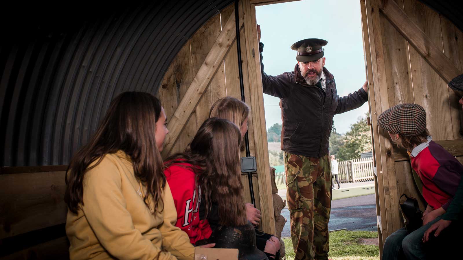 Air Raid Warden warning of oncoming bombing raid