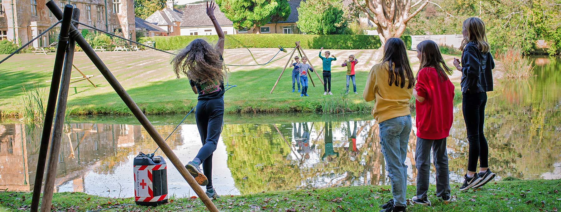 Children bridging the moat at Hooke Court